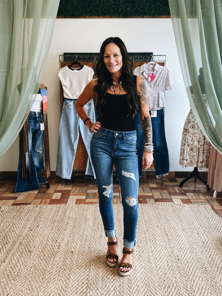 The Fray Forward – Light Wash Mid-Rise Ripped Jean