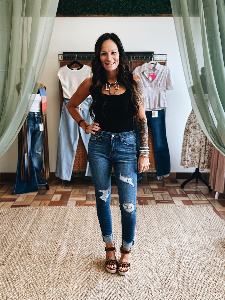 The Fray Forward – Light Wash Mid-Rise Ripped Jean